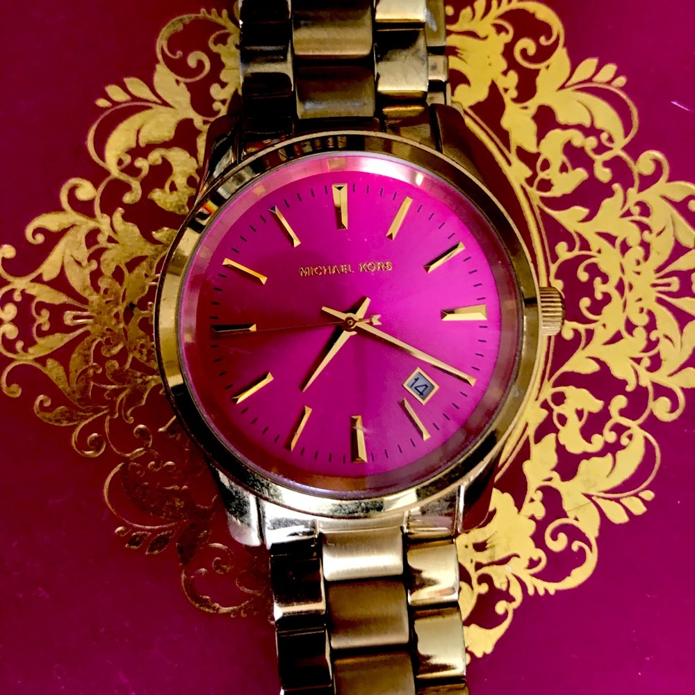 Pink dial and gold band Michael Kors watch